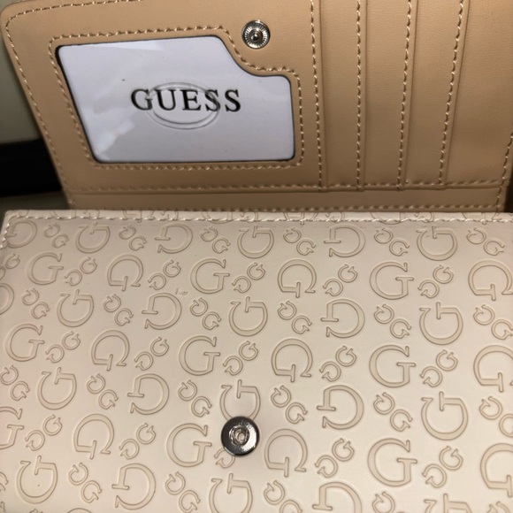 GUESS Cream Logo-Embossed Wristlet Wallet - Picture 8 of 10